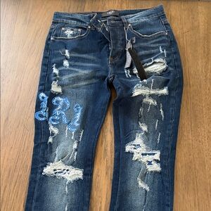 AMIRI Distressed Dark Blue Denim Jeans with Light Blue Embroidery